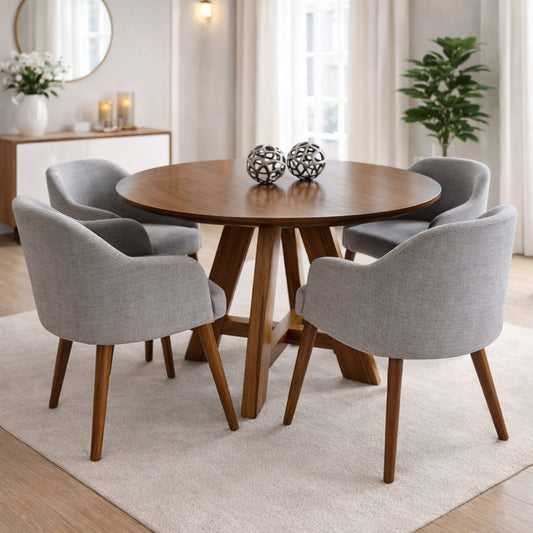 Comedor Brescia redondo de madera tornillo con sillas tipo butaca tapizadas.