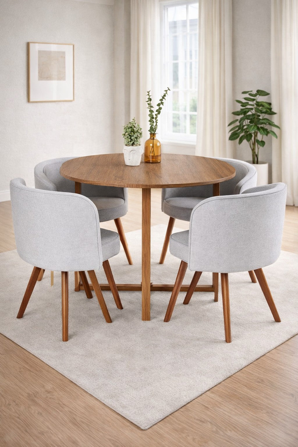 Comedor Positano redondo de madera tornillo de 90 cm con sillas vintage compactas.